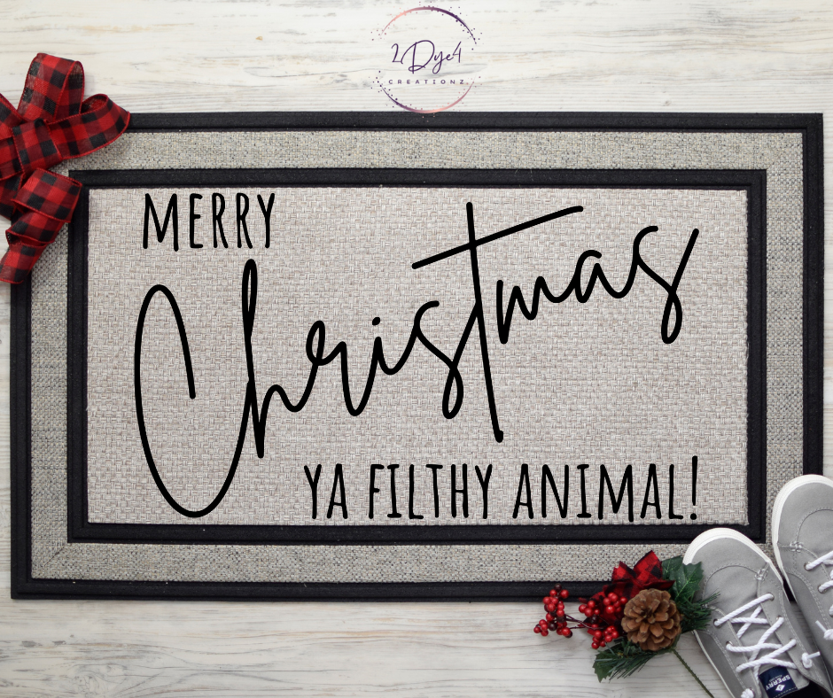 Merry Christmas ya filthy animal (diagonal script) Doormat
